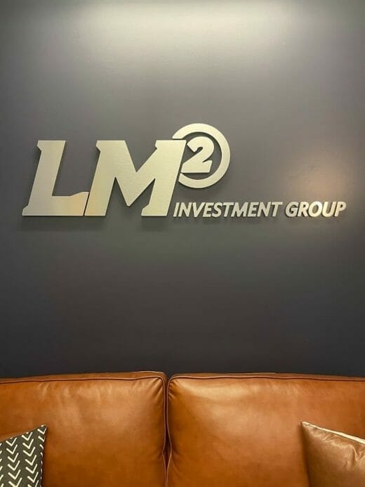 Lm2 investment group logo.